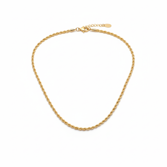 Corrente em aço inoxidável em forma de torção banhada a ouro 18K